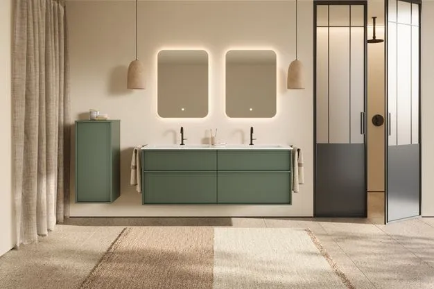 Das gestaltende Element für Fronten, Becken und Waschtischaufteilungen  – hier in der Melaminoberfläche Rauchgrün Matt.